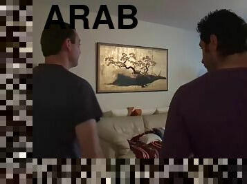 Sexy Arab slut in a hijab blows two guys at the same time