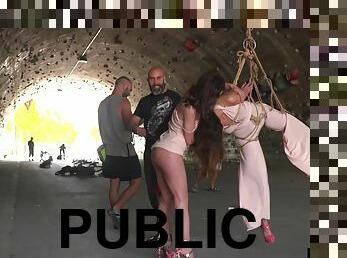 Public whipped suspension bondage slut deepthroats outdoor