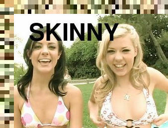 Skinny girls in bikinis have a joyful threesome outdoors