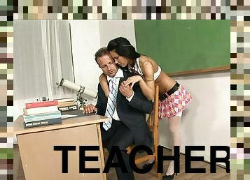 Schoolgirl on the teachers desk takes dick in her asshole