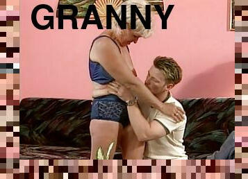 Blonde granny is sucking this tasty cock