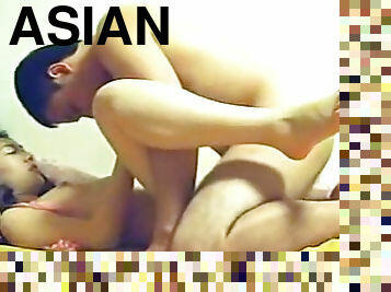 Asian girlfriend is fucking in missionary pose
