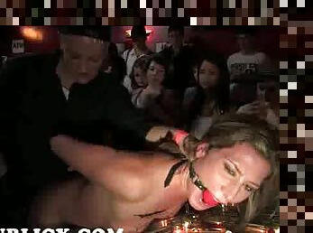 Gagged Ariel X fucked with strap on toy in lesbian bar