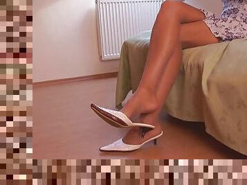 Nylon fetish model showing her sexy feet