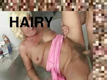 Hairy blonde mature and her young lover