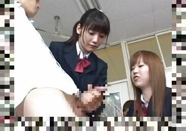 Japanese schoolgirls play with frozen teacher