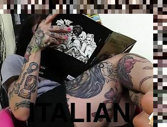 A tattooed girl puts her feet in front of your face