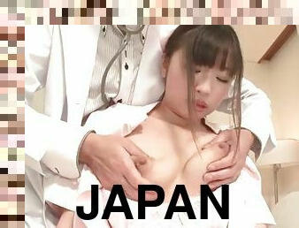 Undressing Japanese nurse to play with her pussy