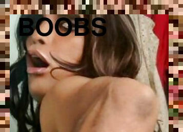Cross dresser enjoys cum on her boobs