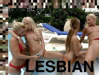 Lesbian foursome in the pool with blondes