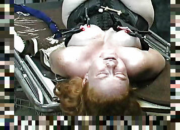 Chubby amateur girl tied up and tortured on the steel table