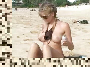 Carli Banks at the beach showing tits