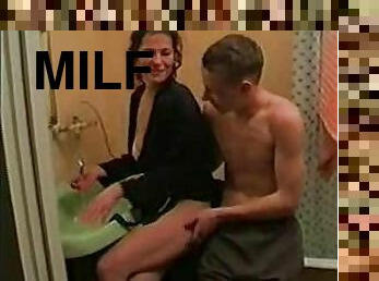 Young man milf fuck in the bathroom