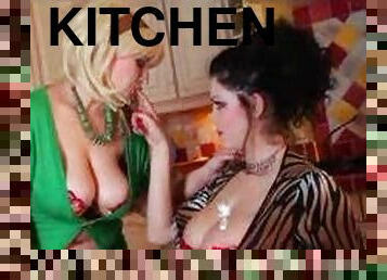 Curvy women in kitchen playing together