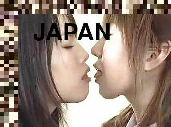Japanese schoolgirls kissing lustily