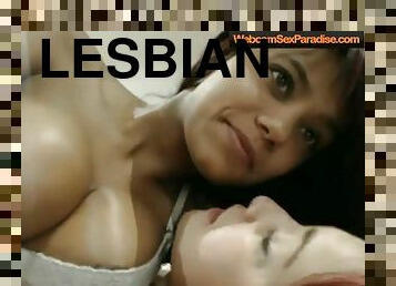 Lesbians with huge tits are kissing and teasing