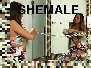 Beautiful Shemale Julia Steinkopf Washes Her Erect Cock at the Sink