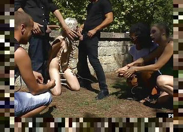 Public deepthroating BDSM slut sucks 2 cocks outdoor