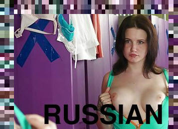 Pale Russian girl Qualin drops her clothes and plays in the locker room