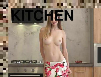 Fit solo model Sandra Phoenix enjoys masturbating in the kitchen