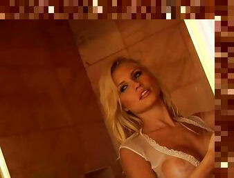 Stunning Carrie Minter takes a shower in sexy white lingerie