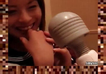 Smiling Japanese teen schoolgirl solo