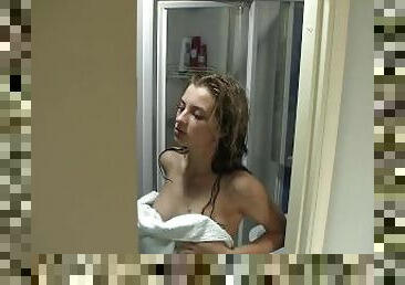 Showering solo teen dries off
