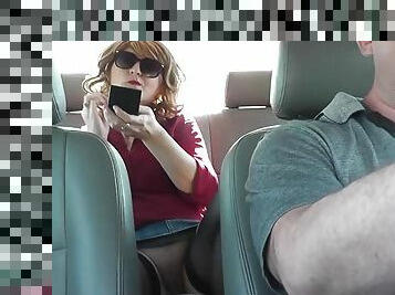 Sexy MILF in stockings without panties in a taxi stopped in public