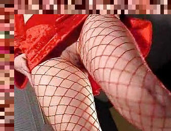 Girl in fishnets putting heel in her cunt