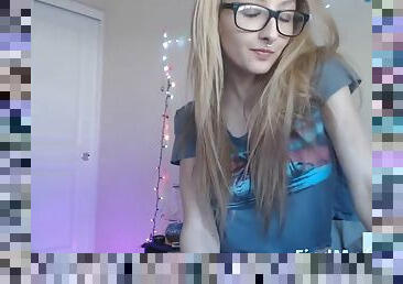 Cute tattooed webcam girl with glasses and big boobs fucks a glass dildo