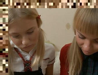 Pair of fascinating schoolgirls and their wicked session on the couch