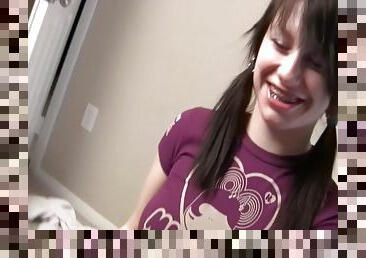 Petite girl with pigtails gives her first hand job