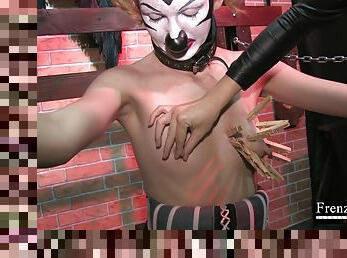 Mature lady is playing really wild with painful clamps on masked teen