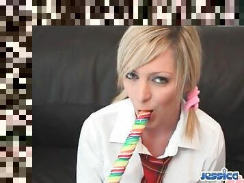 Schoolgirl in pigtails gives a sexy blowjob