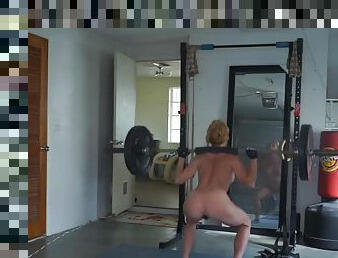 Ginger busty milf working naked in the gym