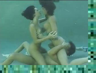 Underwater sex with two hot brunettes