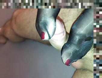 Sexy glossy pantyhose feet give hot footjob