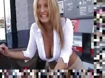 Babe at the gas station showing cleavage