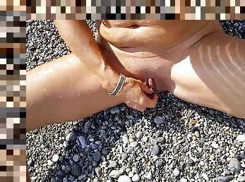 Nippleringlover horny milf naked at nudist beach sexy tanned body extreme pierced nipples and pierced pussy closeup