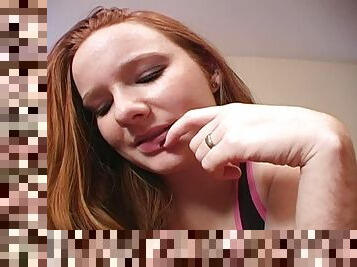 Redheaded Halo Crush is sucking a dildo on camera