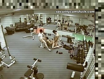 Threesome banging in the gym, watching themselves in bunch of the mirrors around