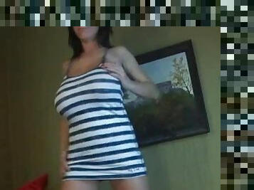 Hot stripteasing brunette with big oily tits teasing on webcam