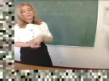 Mature teacher Nina Hartley bends over a desk for a fuck