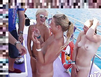 Cute party girls on a boat flashing their tits for the camera