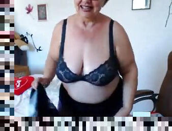 Granny playing with  big boobs on webcam!