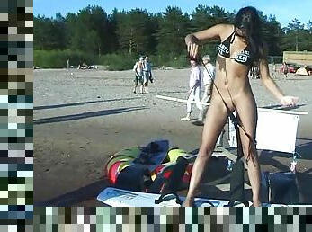 Nudist girls have fun with each other at the beach 2