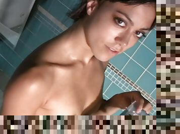 See this petite brunette give her pussy a good fingerin in the shower