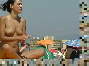 Playful chicks demonstrate their tits in the nude beach