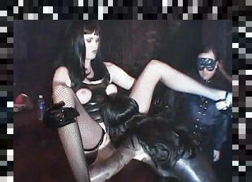 Kinky dungeon scene with pussy eating