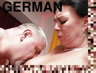 German mature milf with big natural tits licked and fucked in a swinger club